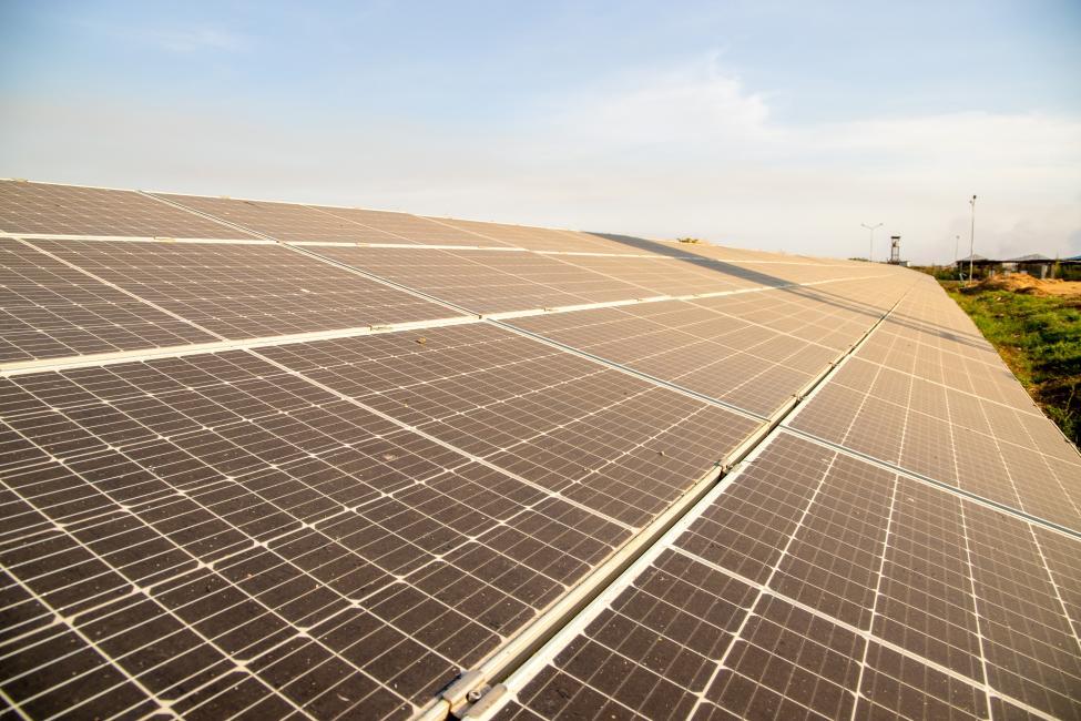 Solar panels generating solar power in the IOM supported Humanitarian Hub in Malaka