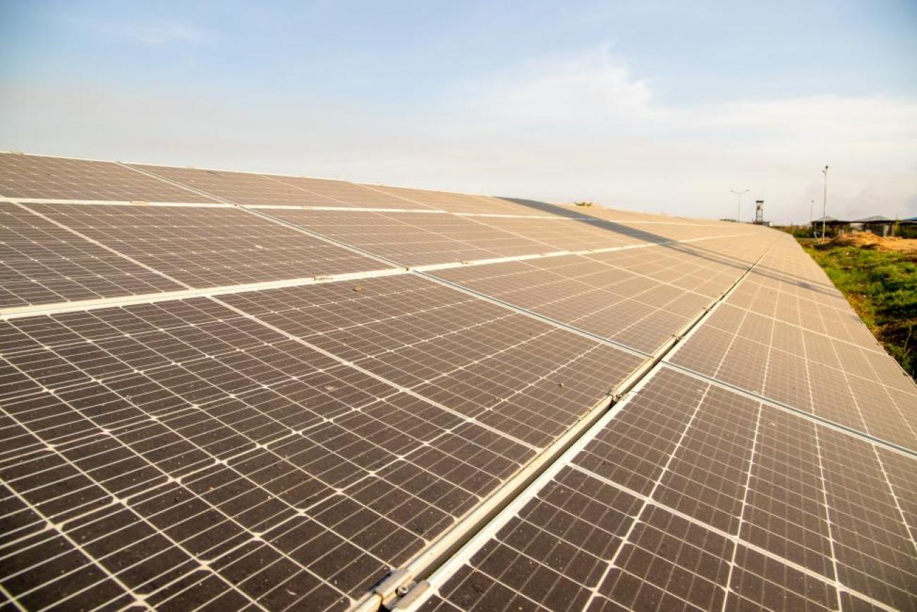 Solar panels generating solar power in the IOM supported Humanitarian Hub in Malaka