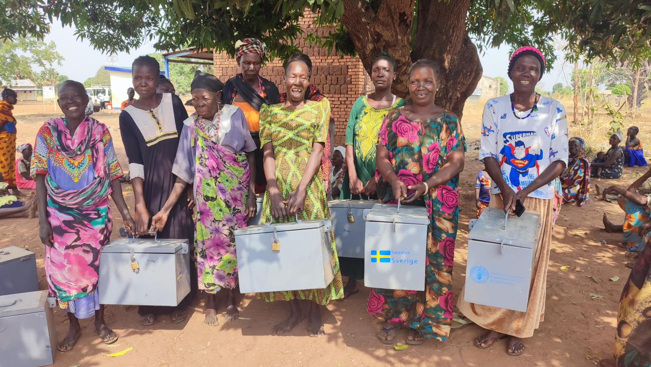 Village Savings and Loan Association (VSLA) members in Busere Boma after receiving their savings kits