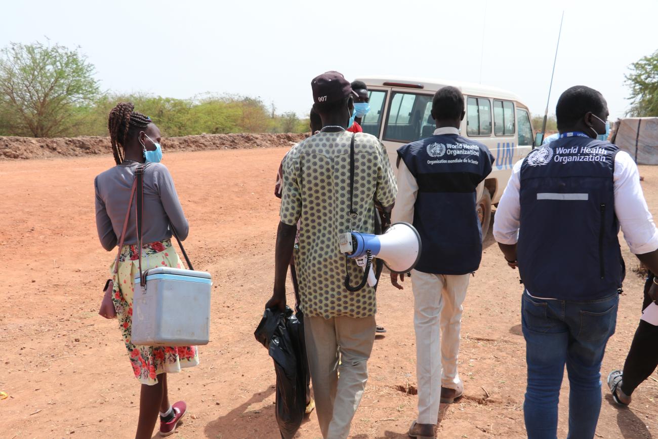 A team of health workers mobilizing for vaccination