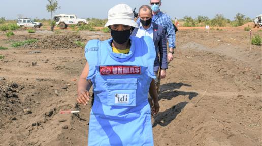 DSRSG/RC/HC Ms. Sara visits a minefield to see UNMAS clearance operations