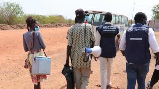 A team of health workers mobilizing for vaccination